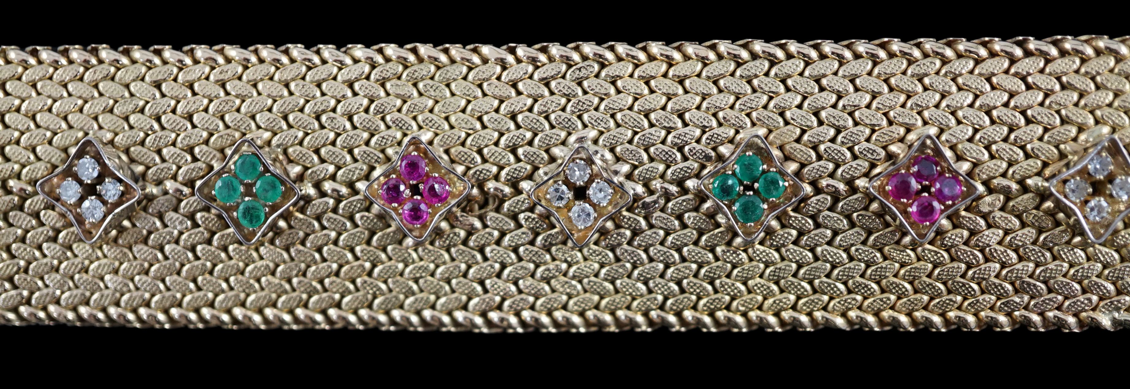 A mid 20th century Italian textured 18ct gold, ruby, emerald and diamond cluster set bracelet